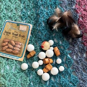 Assorted Craft Beads and Feathers